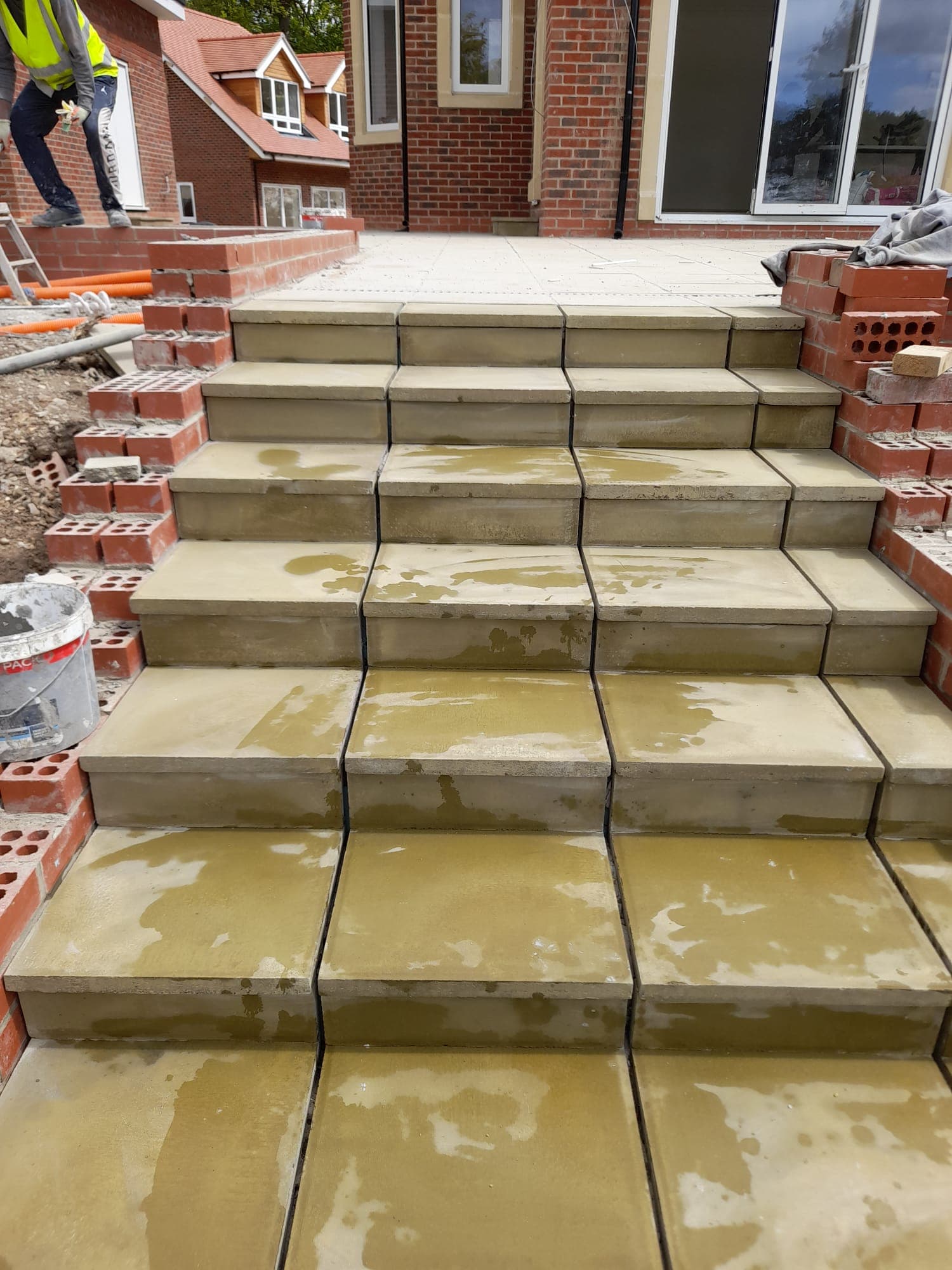 floor, footwear, shoe, person, building, housing, house, staircase, construction, flooring